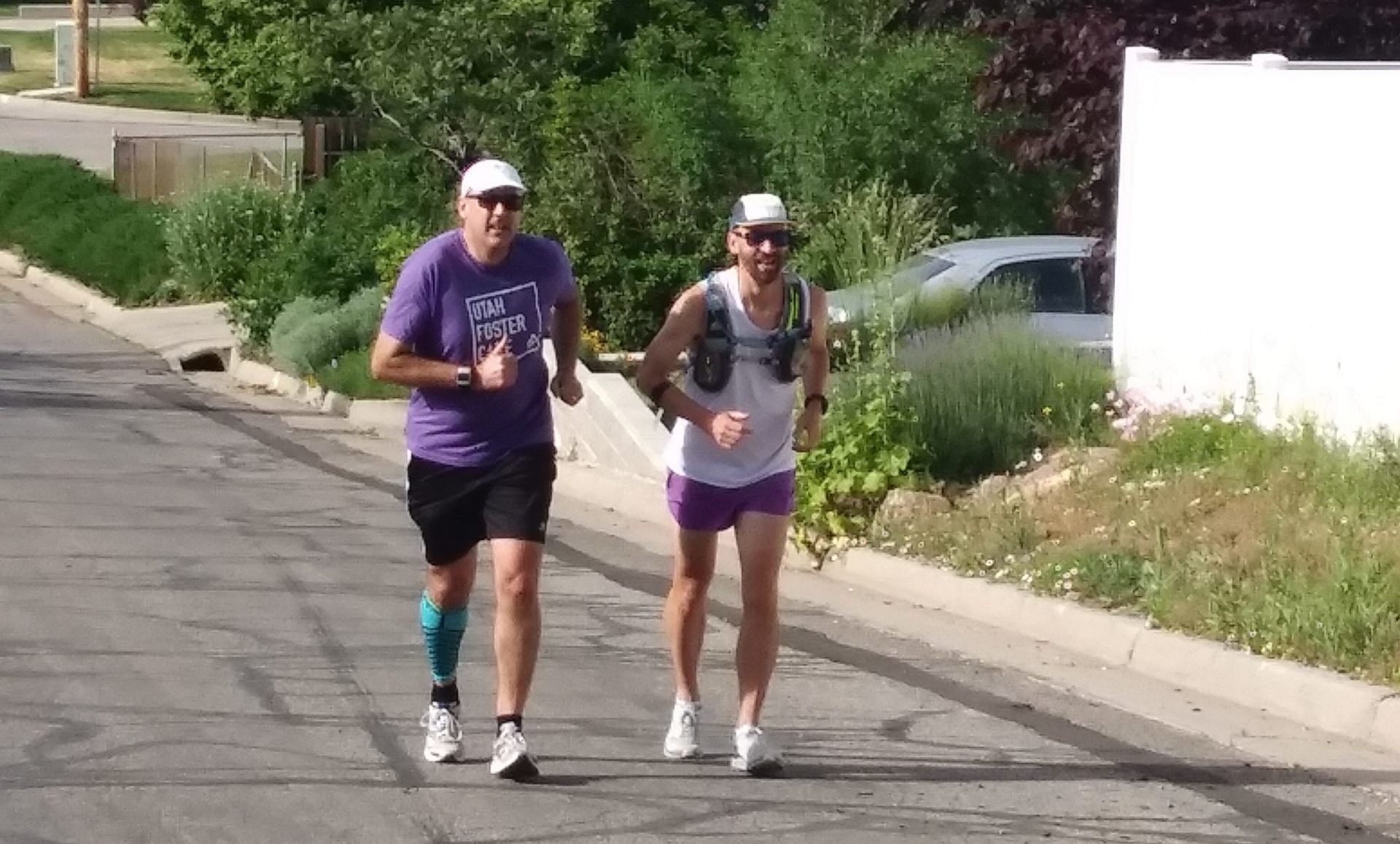 Utah Foster Care CEO, Mike Hamblin runs with Aaron Topance for his birthday fundraiser